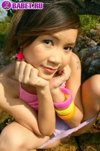 Cookie Wanwalee отдыхает голой на камнях cowa0542.jpg