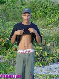 порно фото Дрочит письку на берегу моря 4.jpg